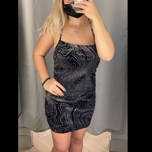 Black w/ silver glitter design, cross back dress